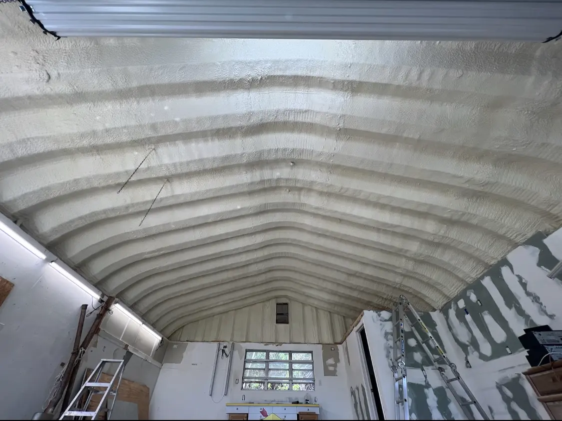 Spray polyurethane foam applied to the underside of a metal roof deck in Whittier